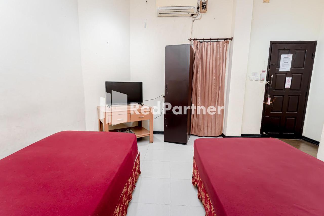 Hotel Cherry Pink Mitra Reddoorz 2*
