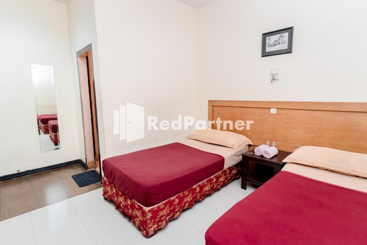 Cherry Pink Mitra Reddoorz Medan