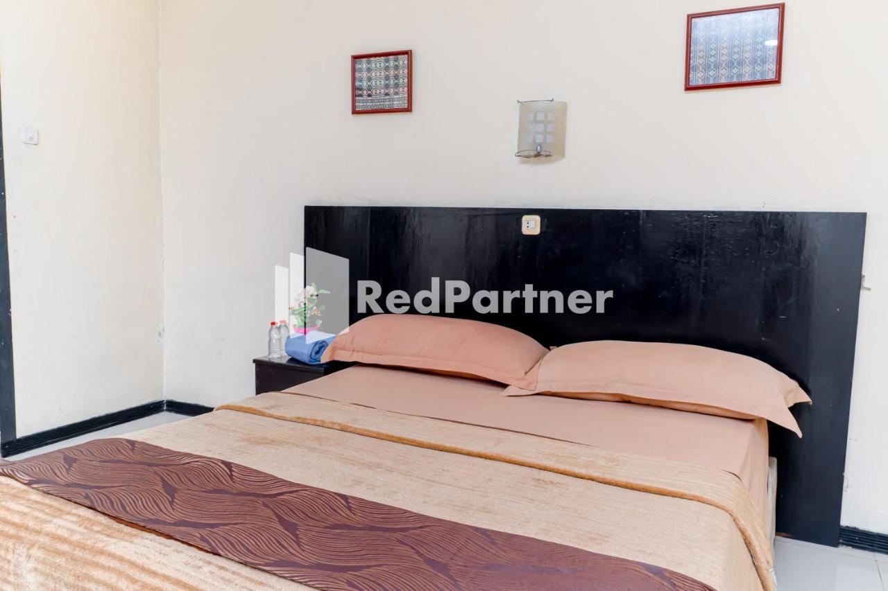 Hotel Cherry Pink Mitra Reddoorz